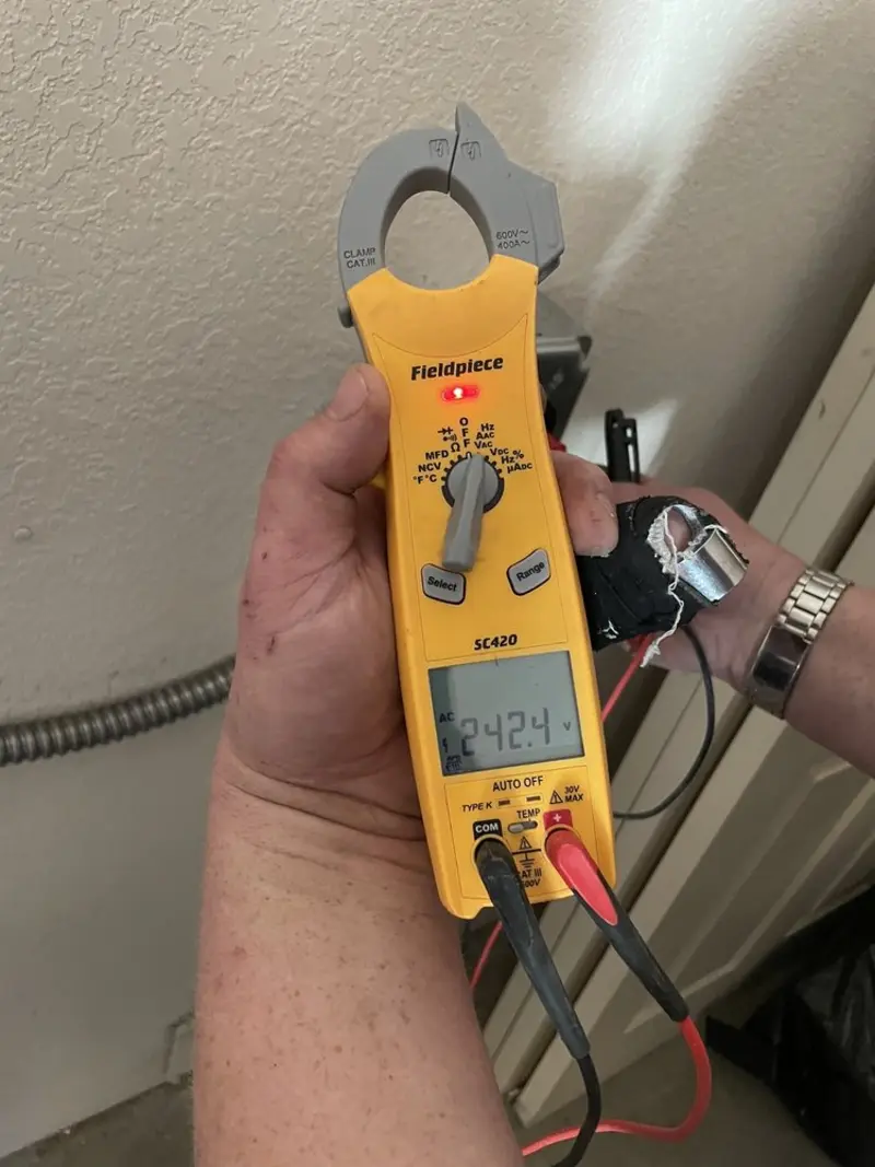 Voltage testing with clamp meter during Generator Installation in Rosemont